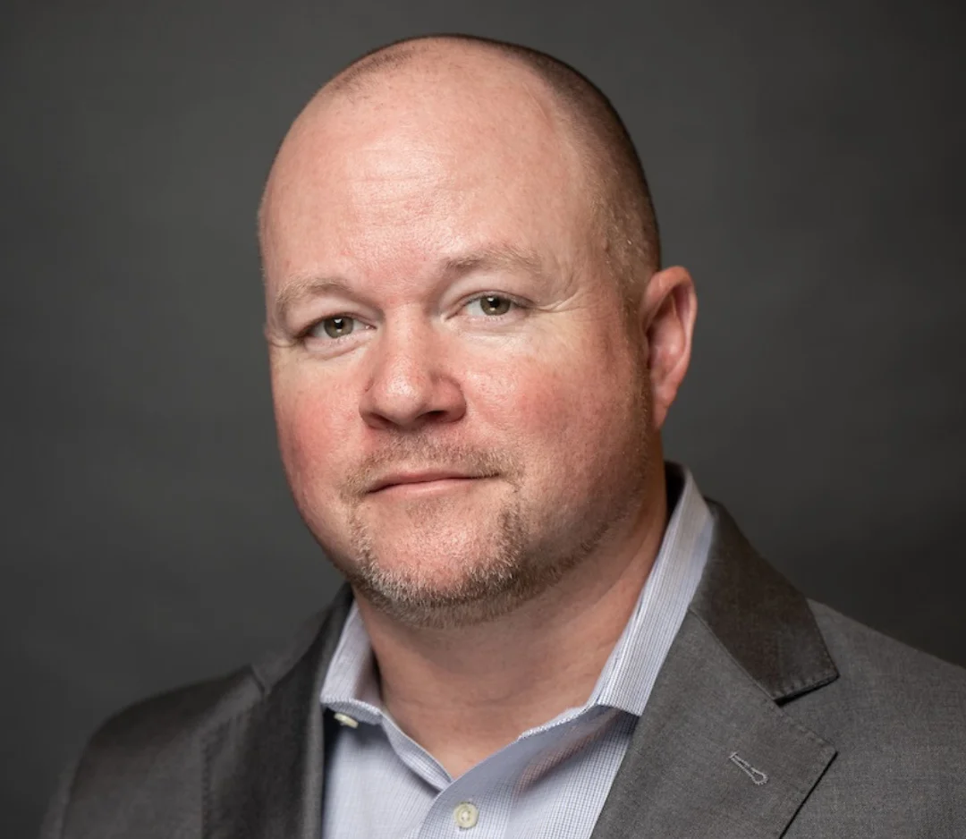 Headshot image of Tod Brindle, webinar host 