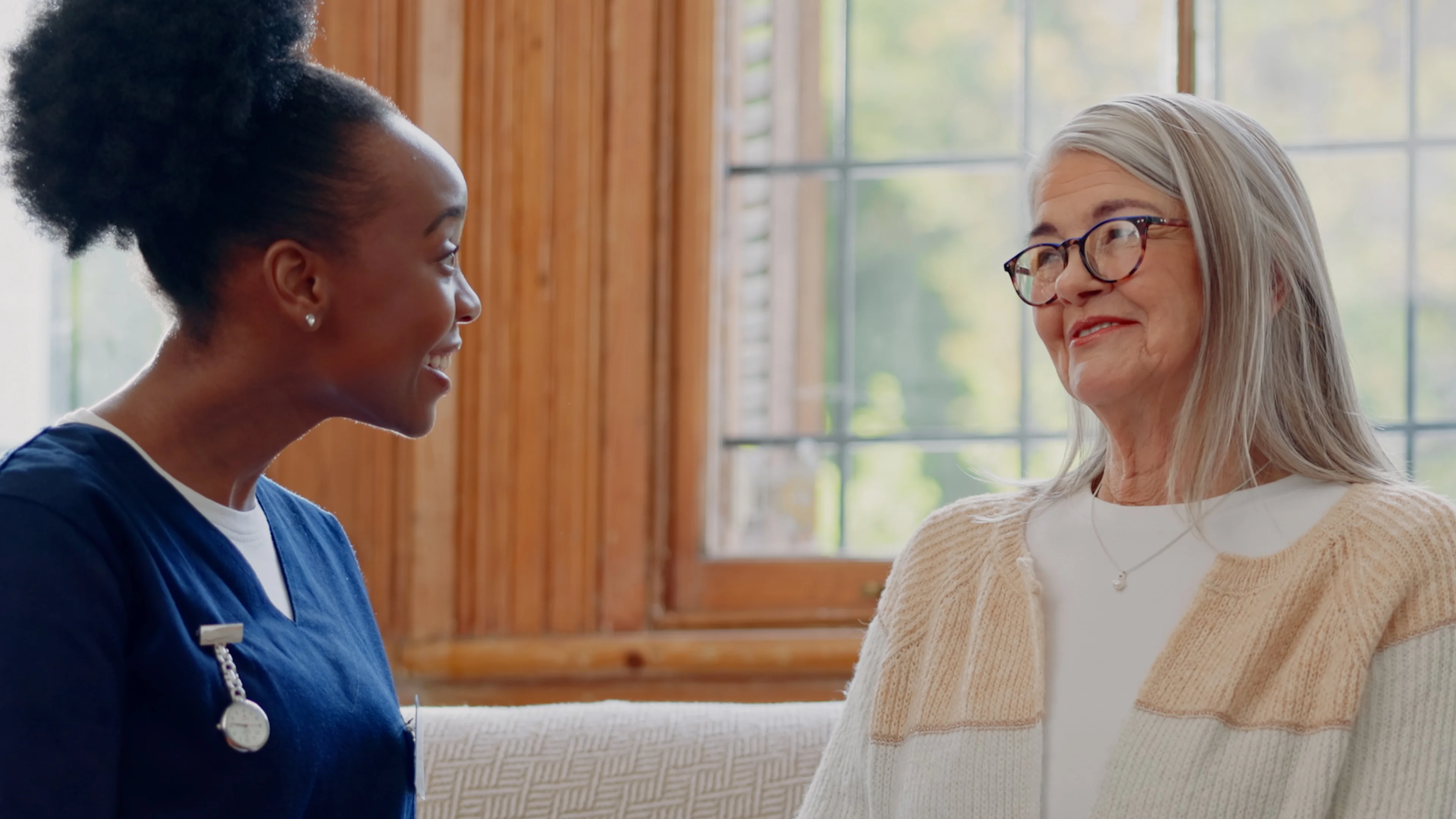 a woman and a man looking at each other