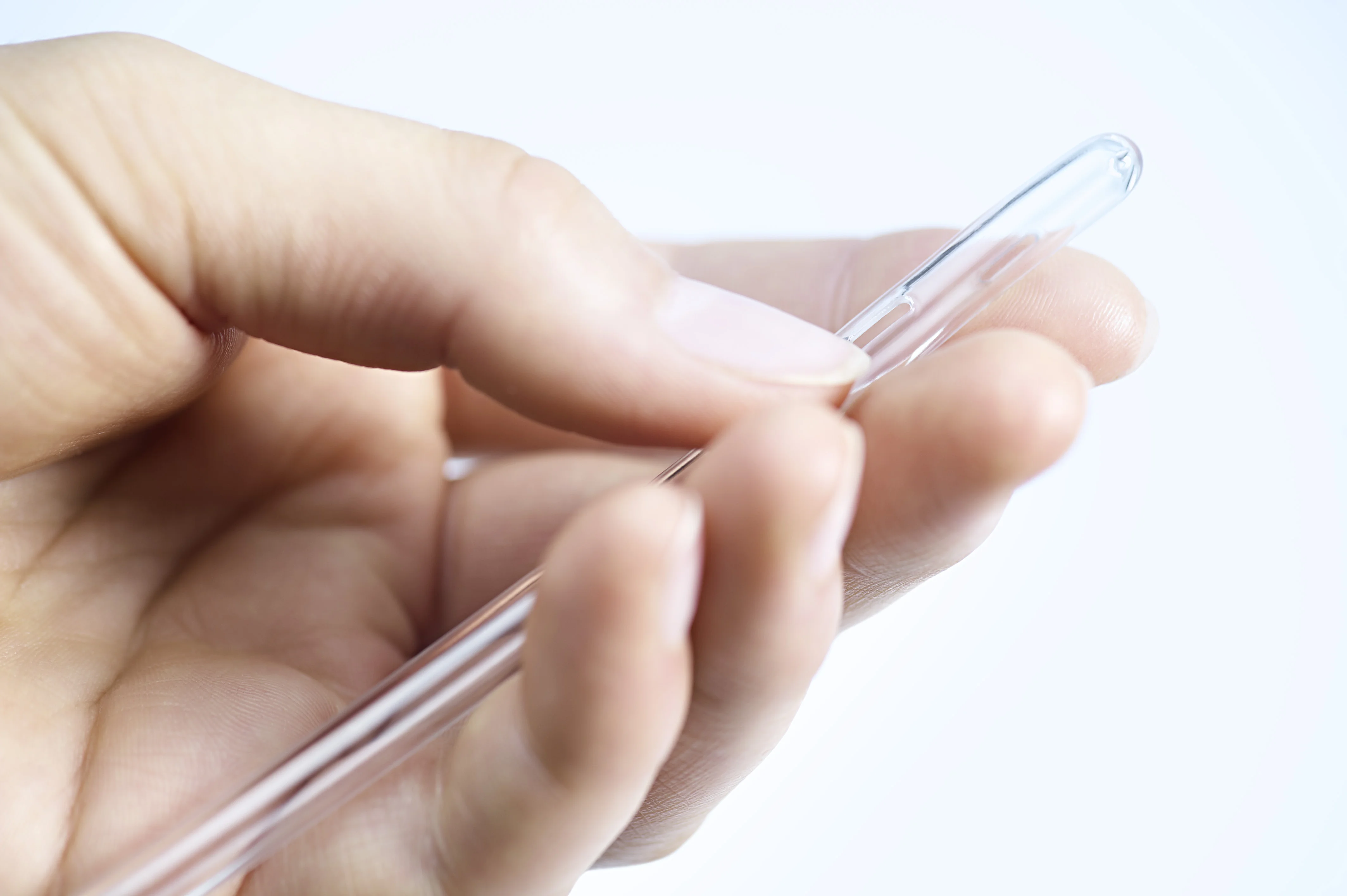 a person holding a pen